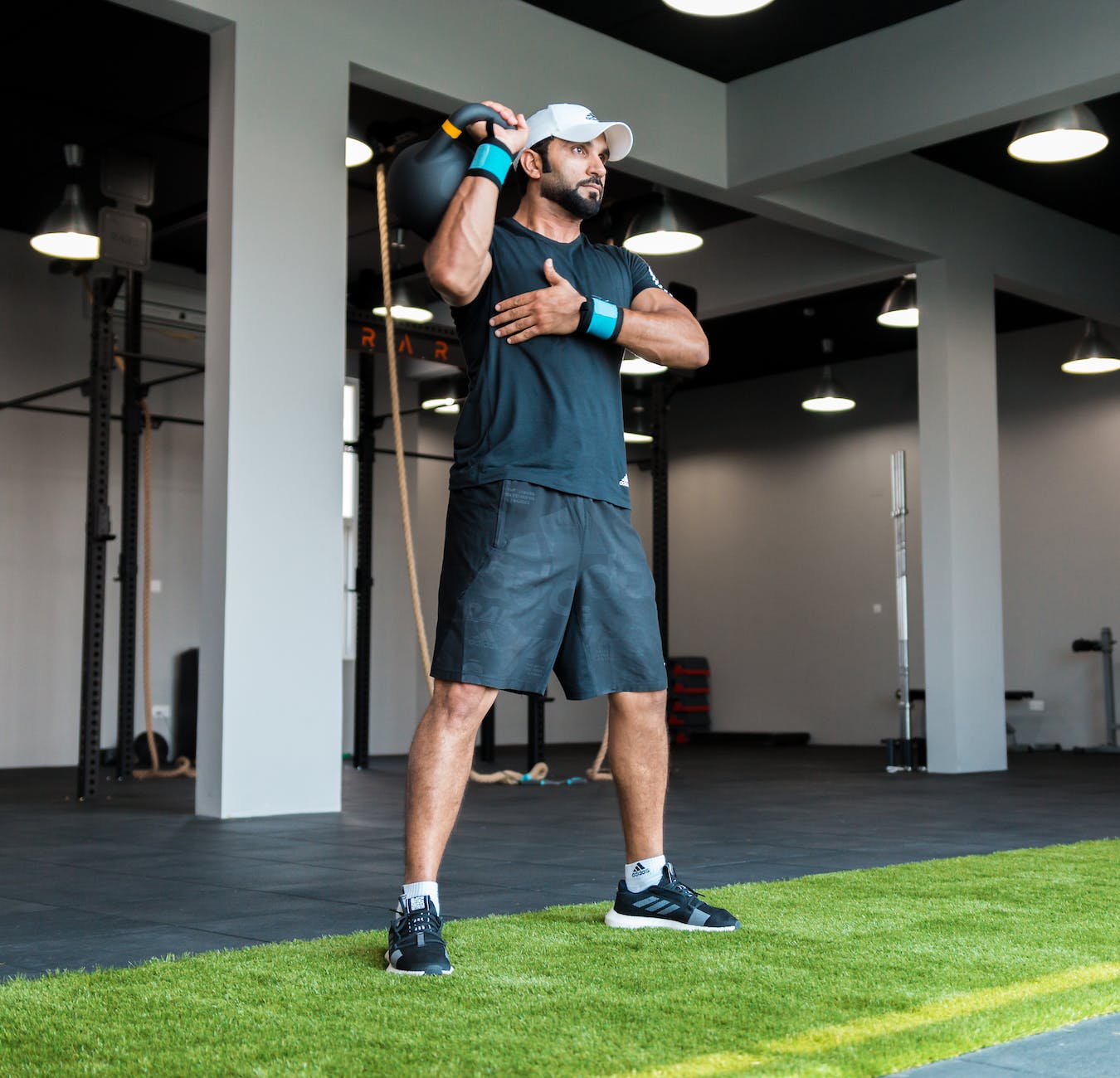 a man working out with a kettlebell