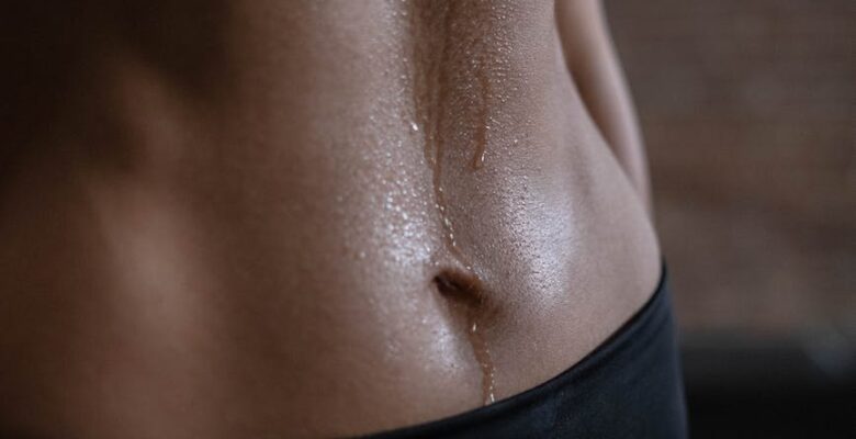 close up view of a person s abs