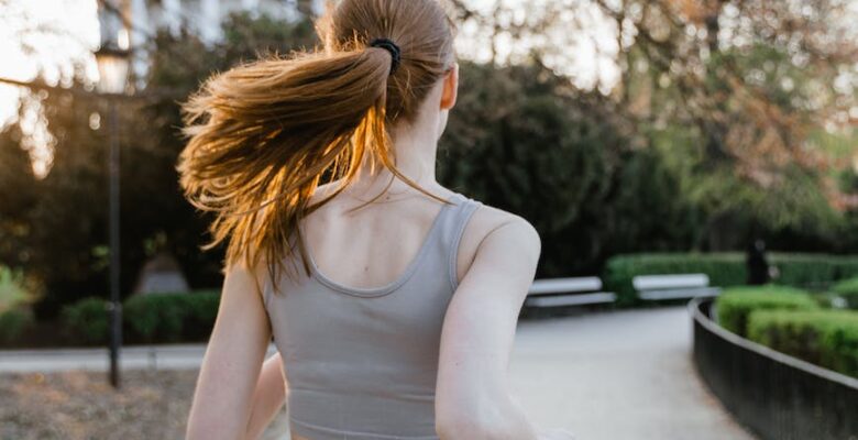 a woman running at the park