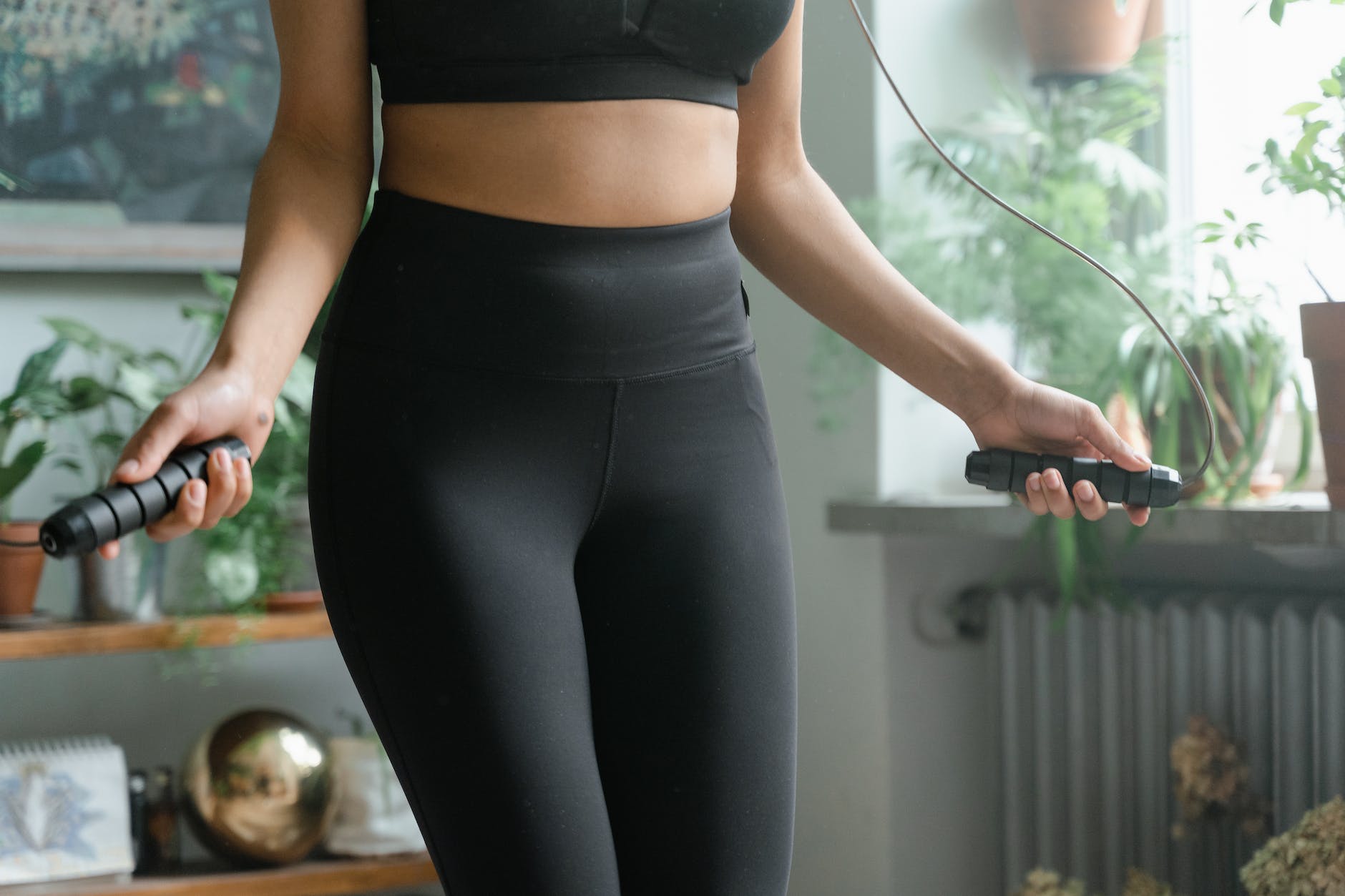 a woman using a jump rope