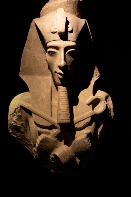 egyptian pharaoh figure in dark