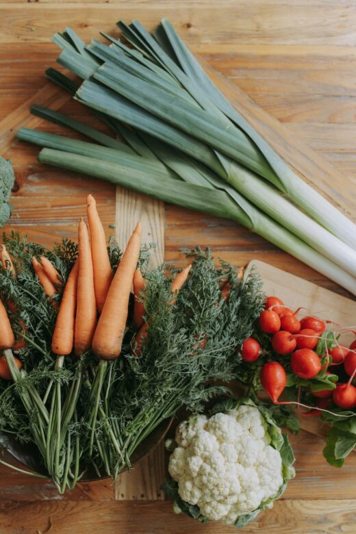 fresh vegetables on wood surface