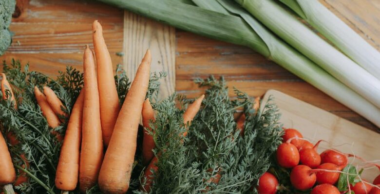 fresh vegetables on wood surface