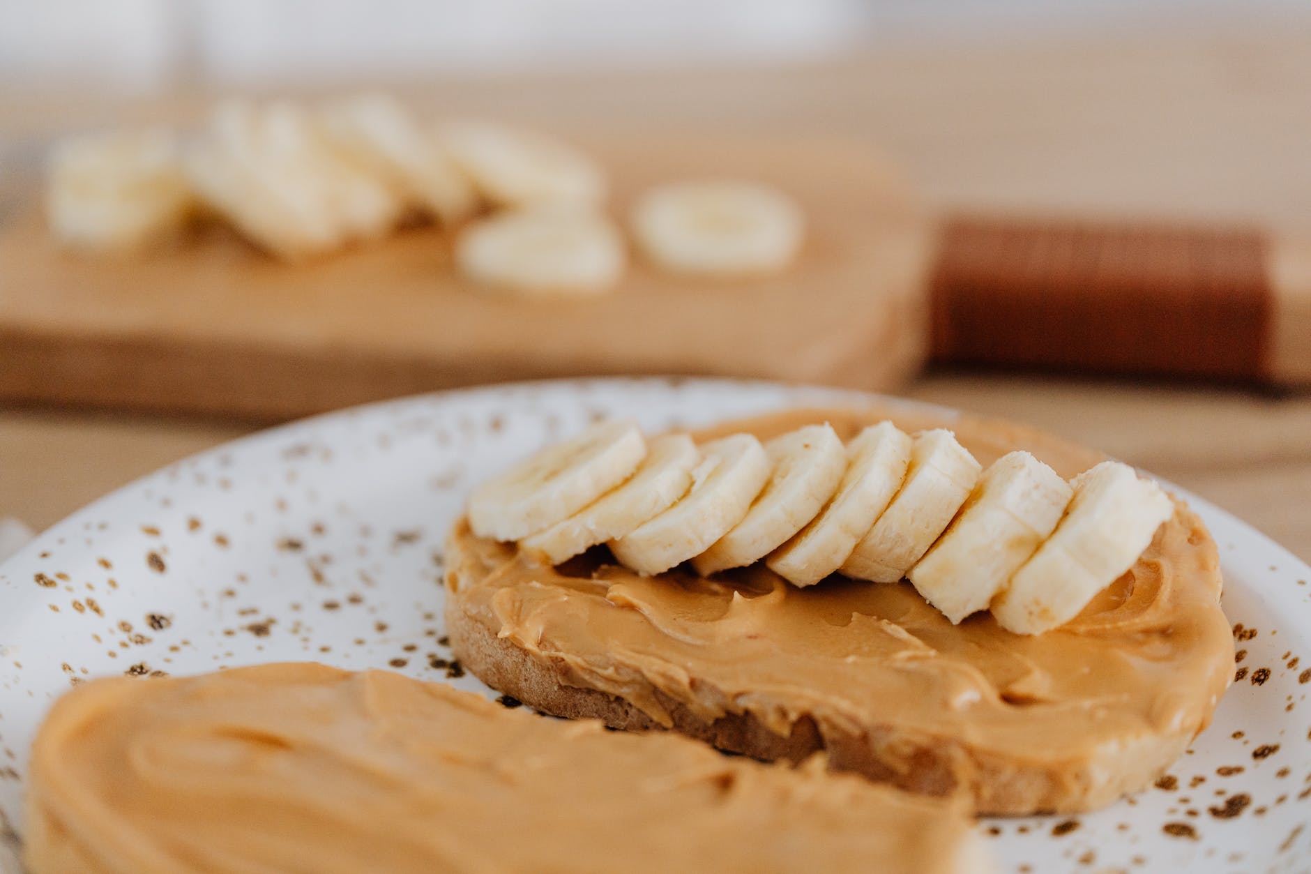 close up photo of sliced banana on a toast