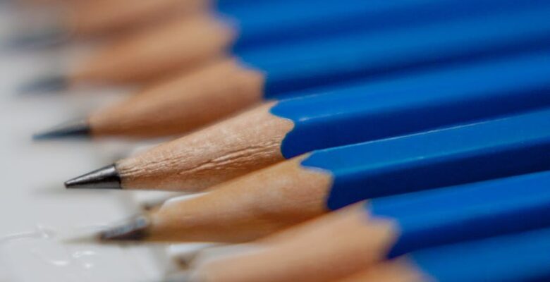 tilt shift lens photography of blue pencils