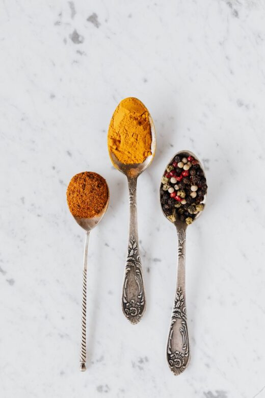 set of aromatic condiments in vintage spoons