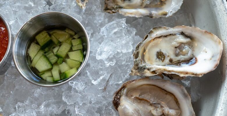 a crushed ice with oysters on top