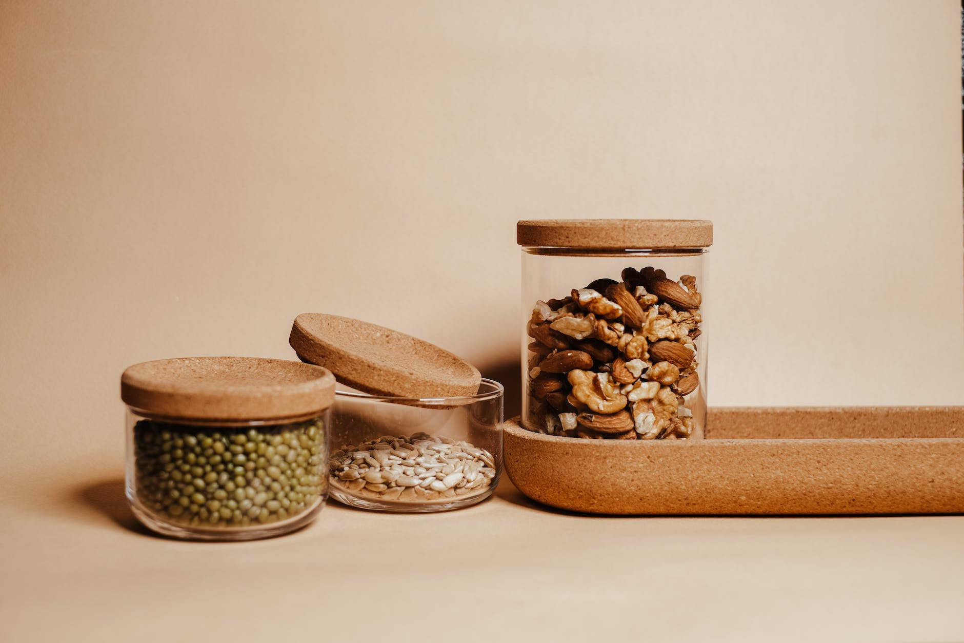 seeds and grains in stored in glass jars