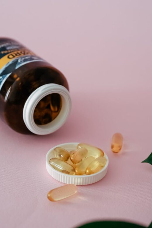 cod liver oil vial and pills