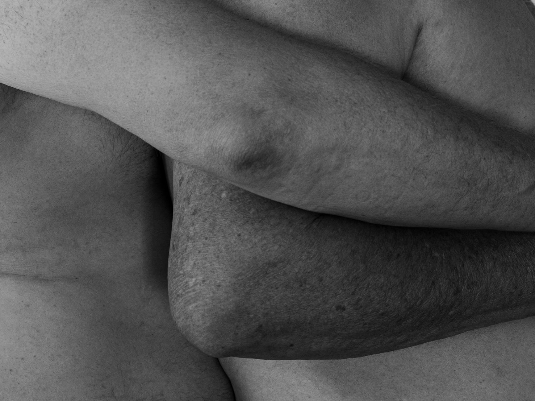 intertwined naked bodies