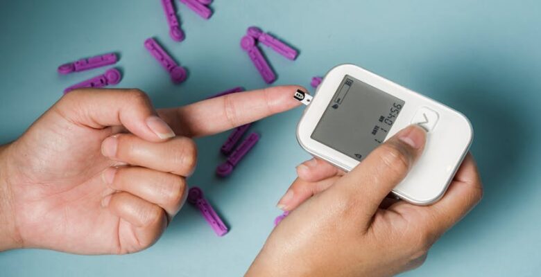 woman checking blood sugar with glucometer
