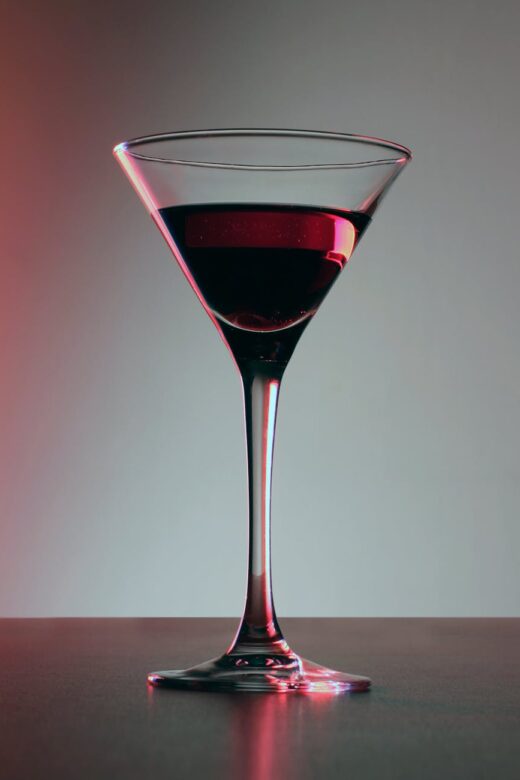 clear martini glass with wine